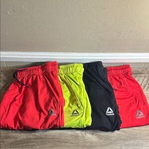 Four Reebok Men’s Athletic Shorts Size Large